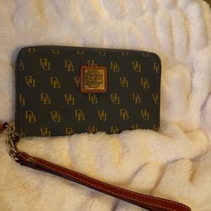 Dooney & Bourke Zip Around Wallet Chocolate Logo Excellent condition.